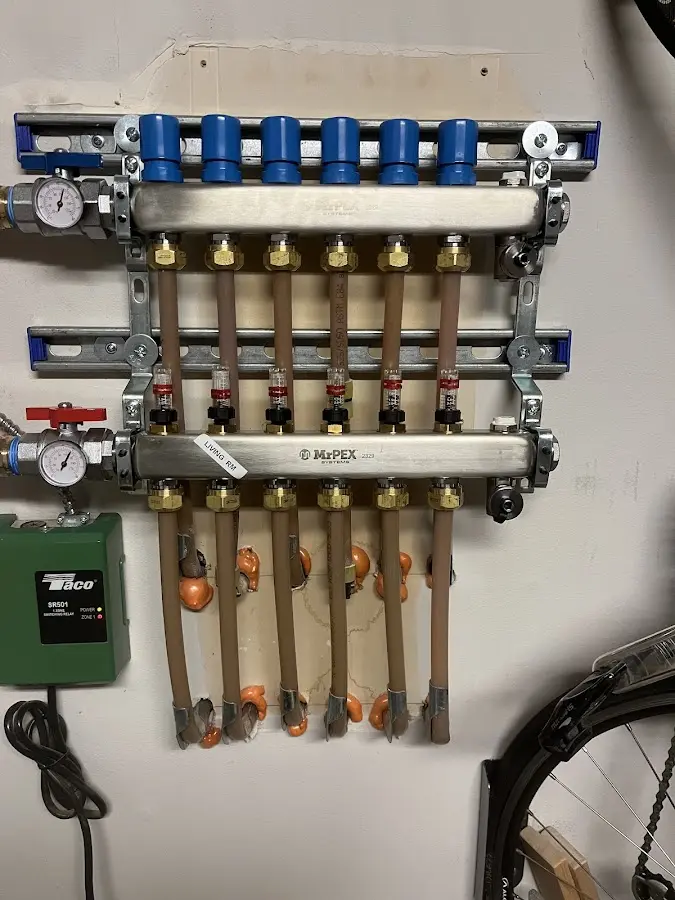 Plumber performing Water Heater Repair at a residential property in Martinez